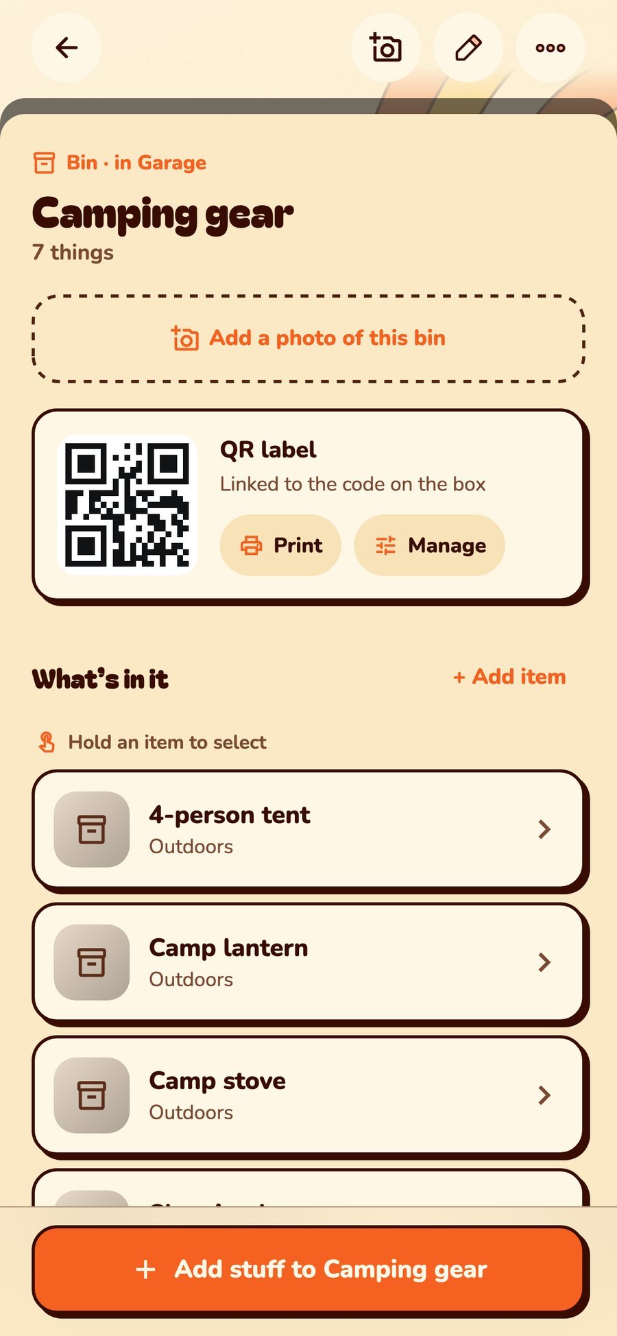 A bin with its QR label and contents listed