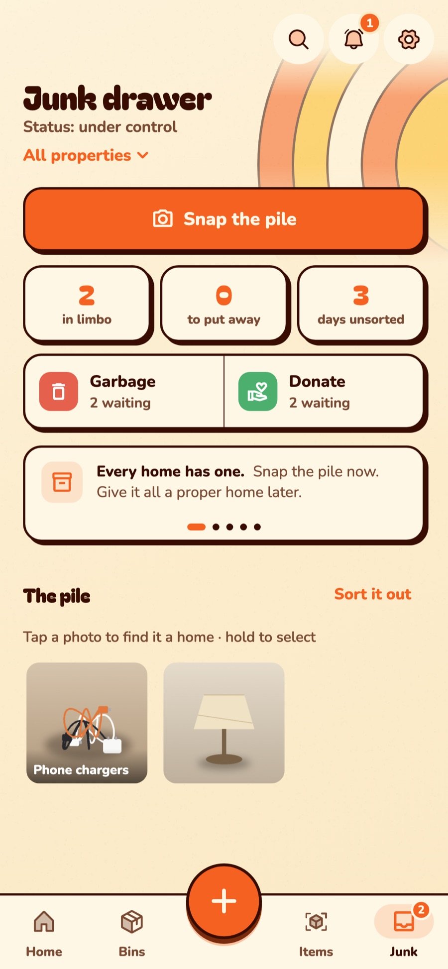 The junk drawer: two things in the pile, and Garbage and Donate lists with two waiting each